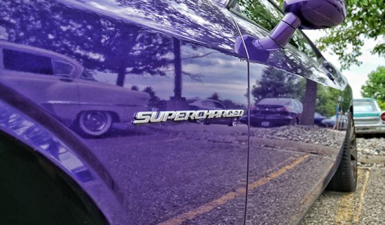 Purple supercharged dodge challenger