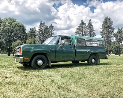 Green Older Truck with a cap