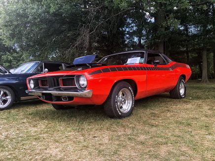 red older car on grass