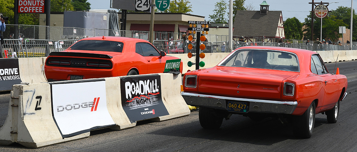 Two read cars racing at Roadkill nights