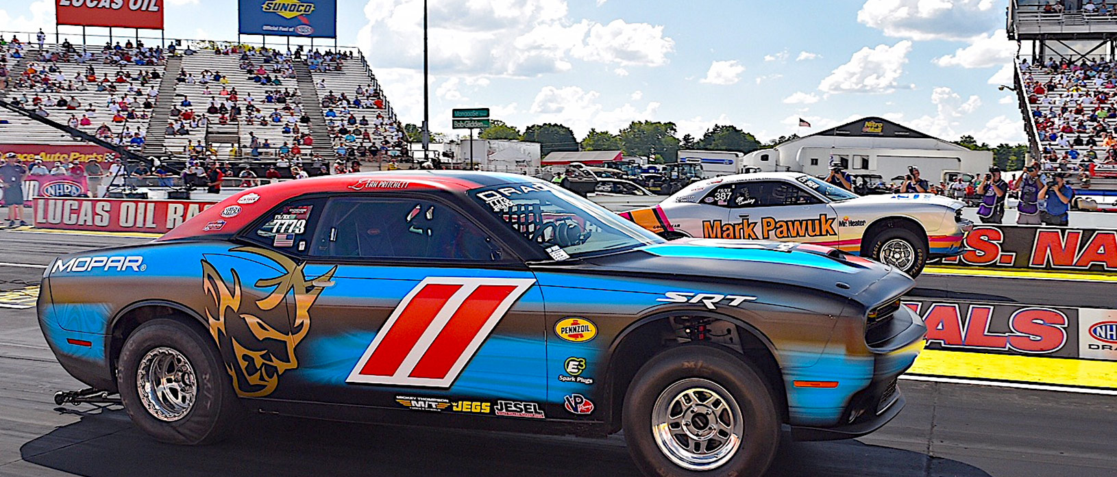 Leah Pritchett racing Mark Pawuk in their Drag Pak's