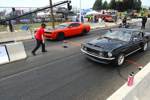 2 cars racing at Roadkill Nights