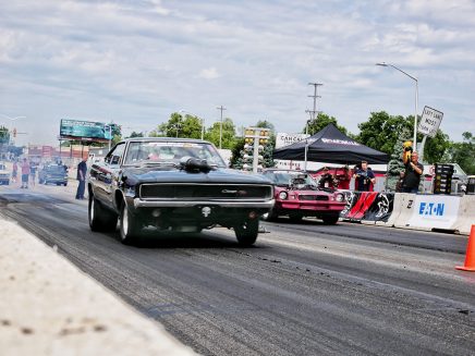 2 cars racing at Roadkill Nights