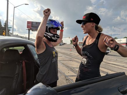 Leah giving Christy Lee a pep talk before racing at Roadkill Nights