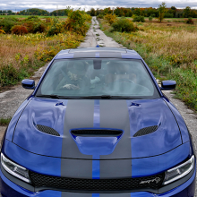 Blue 2018 Dodge Charger SRT Hellcat parked on rural abandoned road