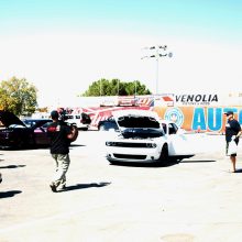 After Thursday’s corner-fest, Friday brought us all to the historic Bakersfield 1320, where a pair of appropriately named Scat Pack 1320 vehicles waited to play. Here the Roadkill production team mounts camera and audio gear before the competition begins.