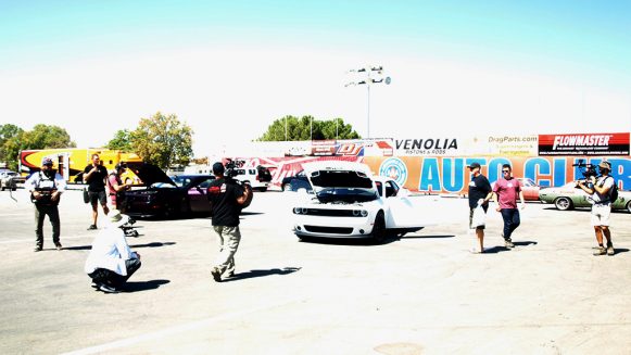 After Thursday’s corner-fest, Friday brought us all to the historic Bakersfield 1320, where a pair of appropriately named Scat Pack 1320 vehicles waited to play. Here the Roadkill production team mounts camera and audio gear before the competition begins.