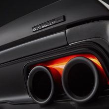 The lower exhaust tips of the 1968 Dodge “Super Charger” are eliminated and replaced with Alfa Romeo Stelvio 5-inch dual-walled tips re-engineered to run through the taillamp housing. Brake lights have been uniquely reconfigured with LED lights to glow around the exhaust tips.