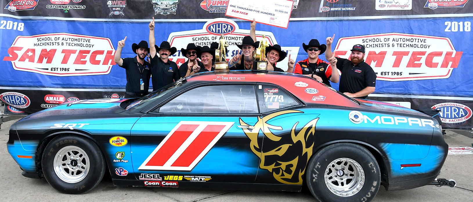 Leah Pritchett and her crew celebrating Factory Stock Showdown win