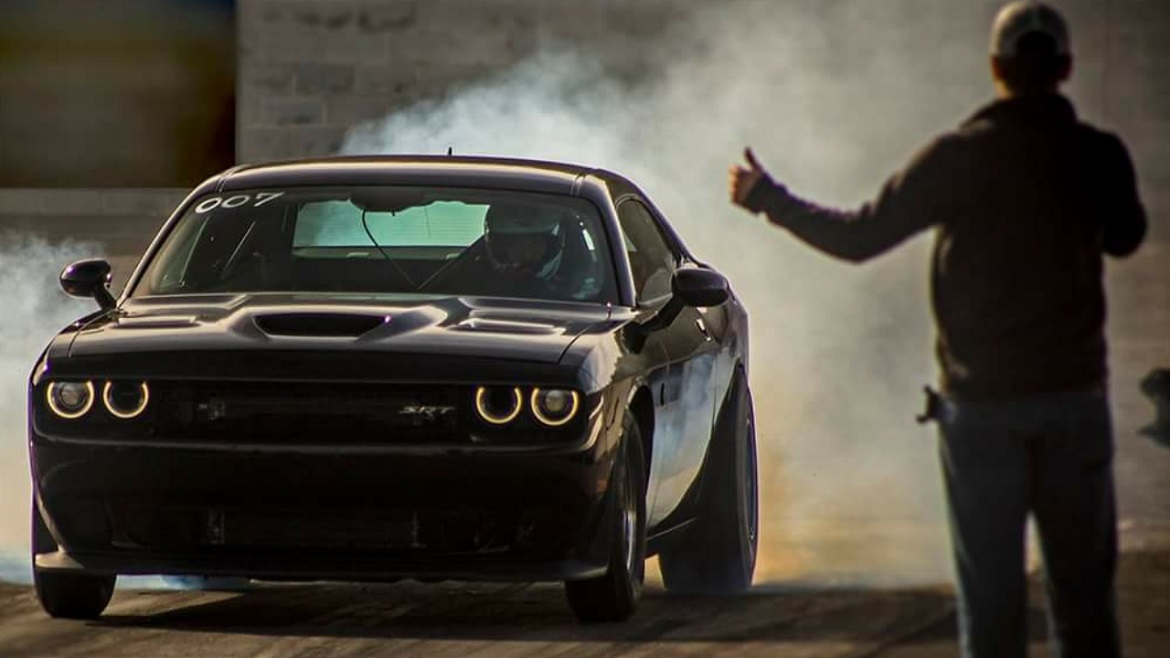 Dodge Challenger SRT® Hellcat doing a burnout before racing