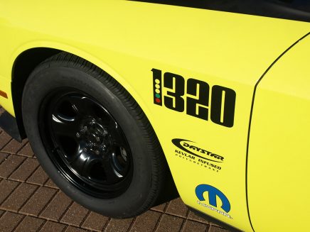 The 1320 fender logos make inventive use of the iconic drag strip “Christmas tree” starting line signal. The comparatively narrow front tires are in keeping with drag strip thinking where wide front rubber defeats quickness through increased rolling resistance and weight.