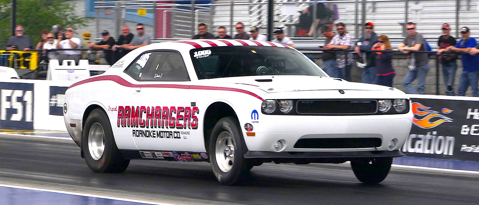 White Ramchargers Drag Pak racing down the drag strip