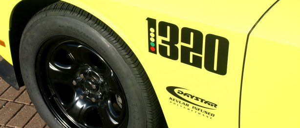 The 1320 fender logos make inventive use of the iconic drag strip “Christmas tree” starting line signal. The comparatively narrow front tires are in keeping with drag strip thinking where wide front rubber defeats quickness through increased rolling resistance and weight.
