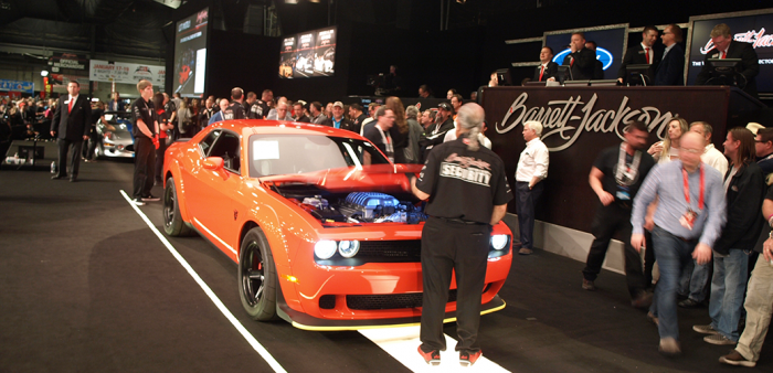 Go Mango Dodge Demon on the auction block at Barrett-Jackson auction