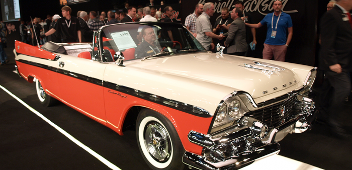 Red and white 1958 Custom Royal convertible at Barrett-Jackson auction