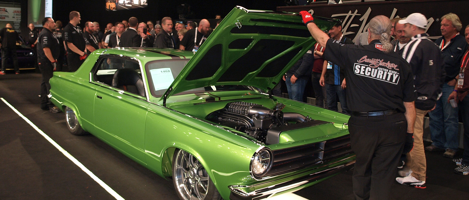 Green 1965 Dart on the auction block at Barrett-Jackson auction