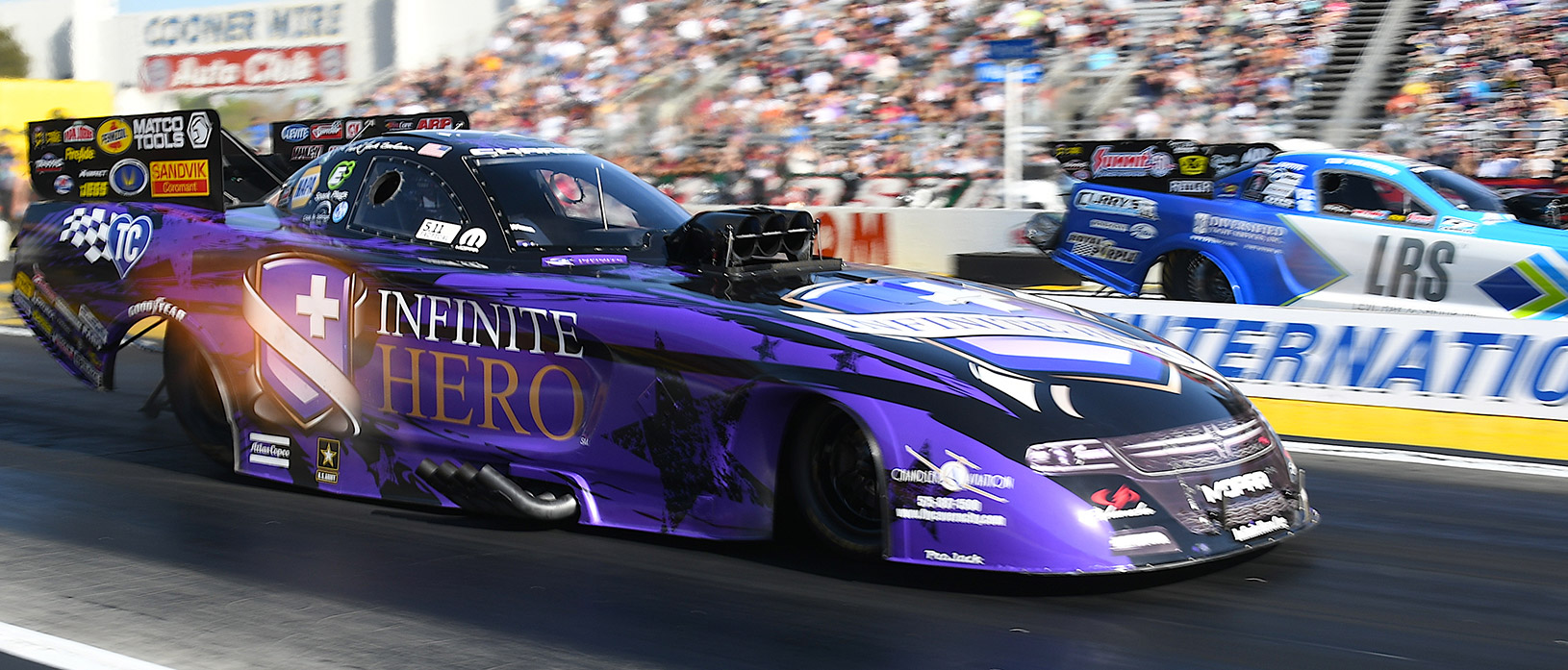 Jack Beckman racing his funny car at NHRA Winternationals