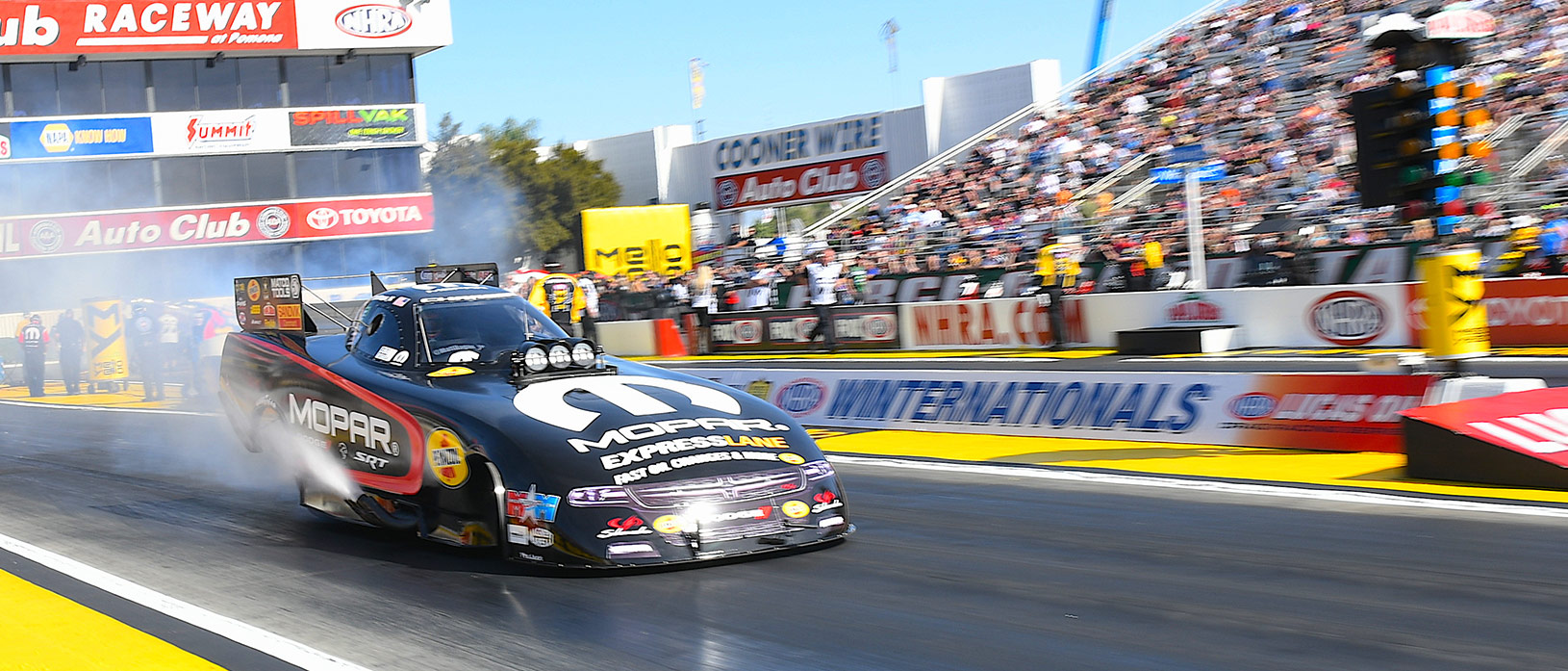 Matt Hagan racing his funny car at NHRA Winternationals