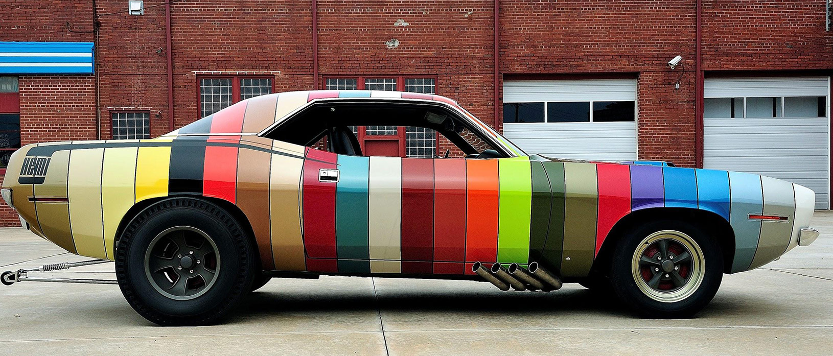 Dodge Challenger painted in stripes of heritage colors