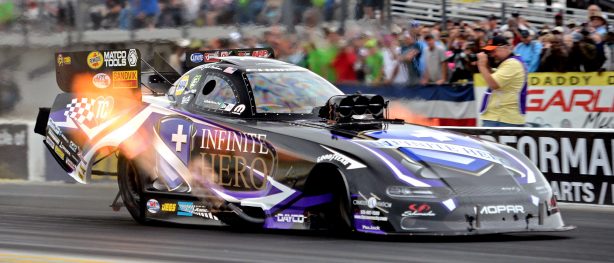 Jack Beckman's Infinite Hero Funny Car racing down the track at NHRA Gatornationals