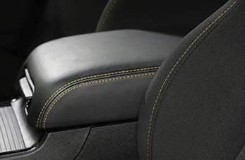 Gold stitching on seat and console of stars & stripes package