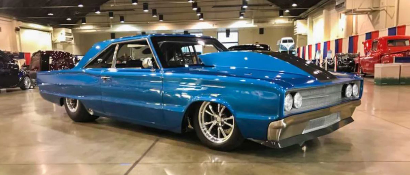Blue 1966 Dodge Coronet with black stripe