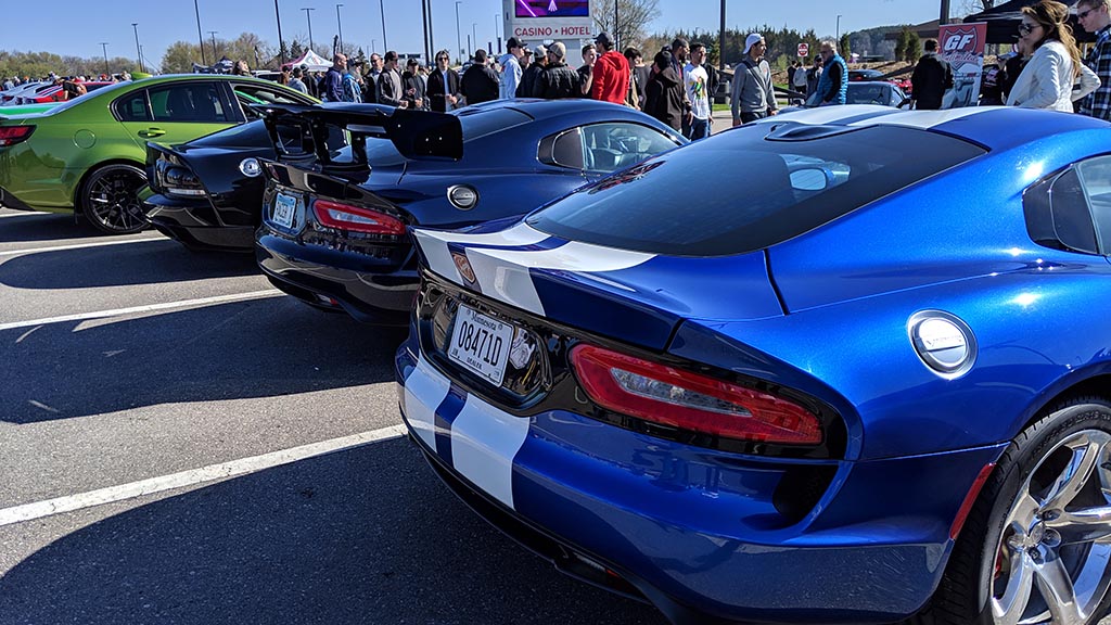Row of Vipers with group of people at Cars & Coffee Minnesota