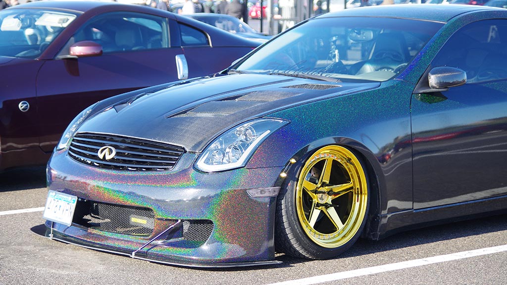 Infiniti with custom paint color with rainbow glitter