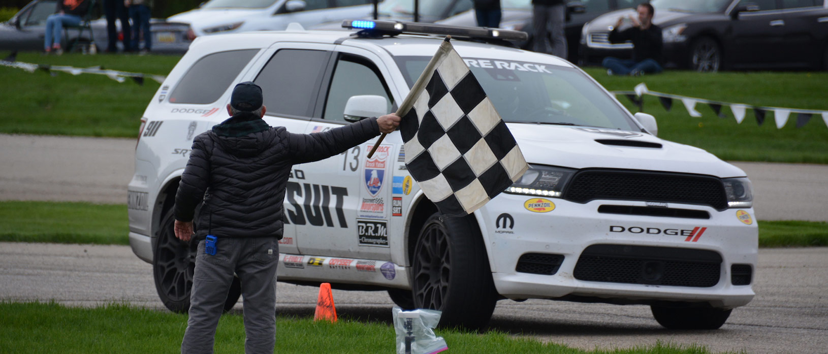 Durango SRT Pursuit driving up on the checkered flag