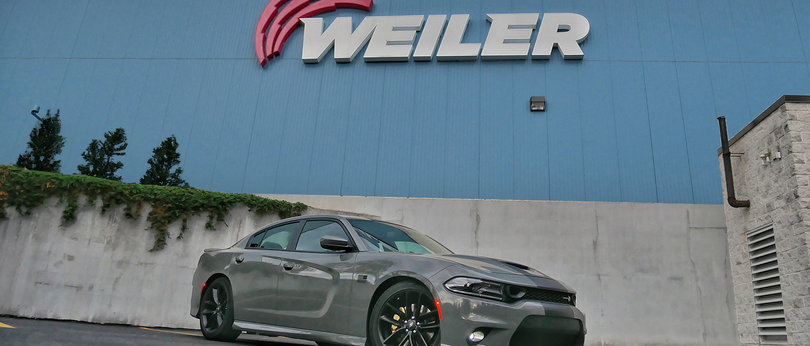 destroyer grey dodge challenger scat pack infront of Weiler building