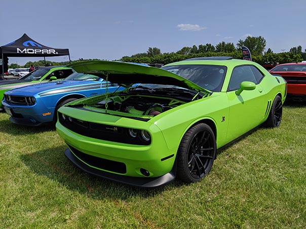 Row of Challengers on display at Mopars in the Park