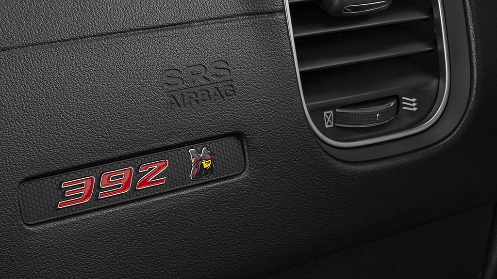 New Scat Pack instrument panel badge with “392” and multi-color Scat Pack Bee in the 2020 Dodge Charger Scat Pack Widebody