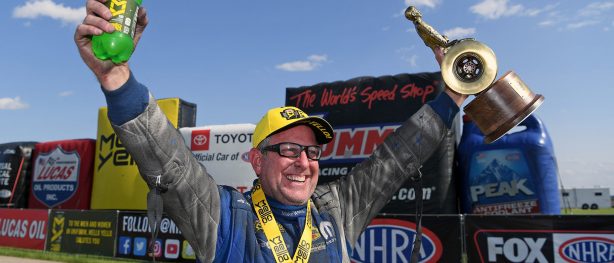 Tommy Johnson Jr. celebrating his win at the NHRA Route 66 Nationals