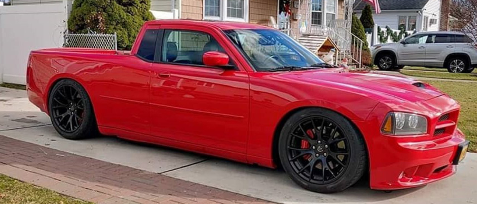 a red dodge charger ute