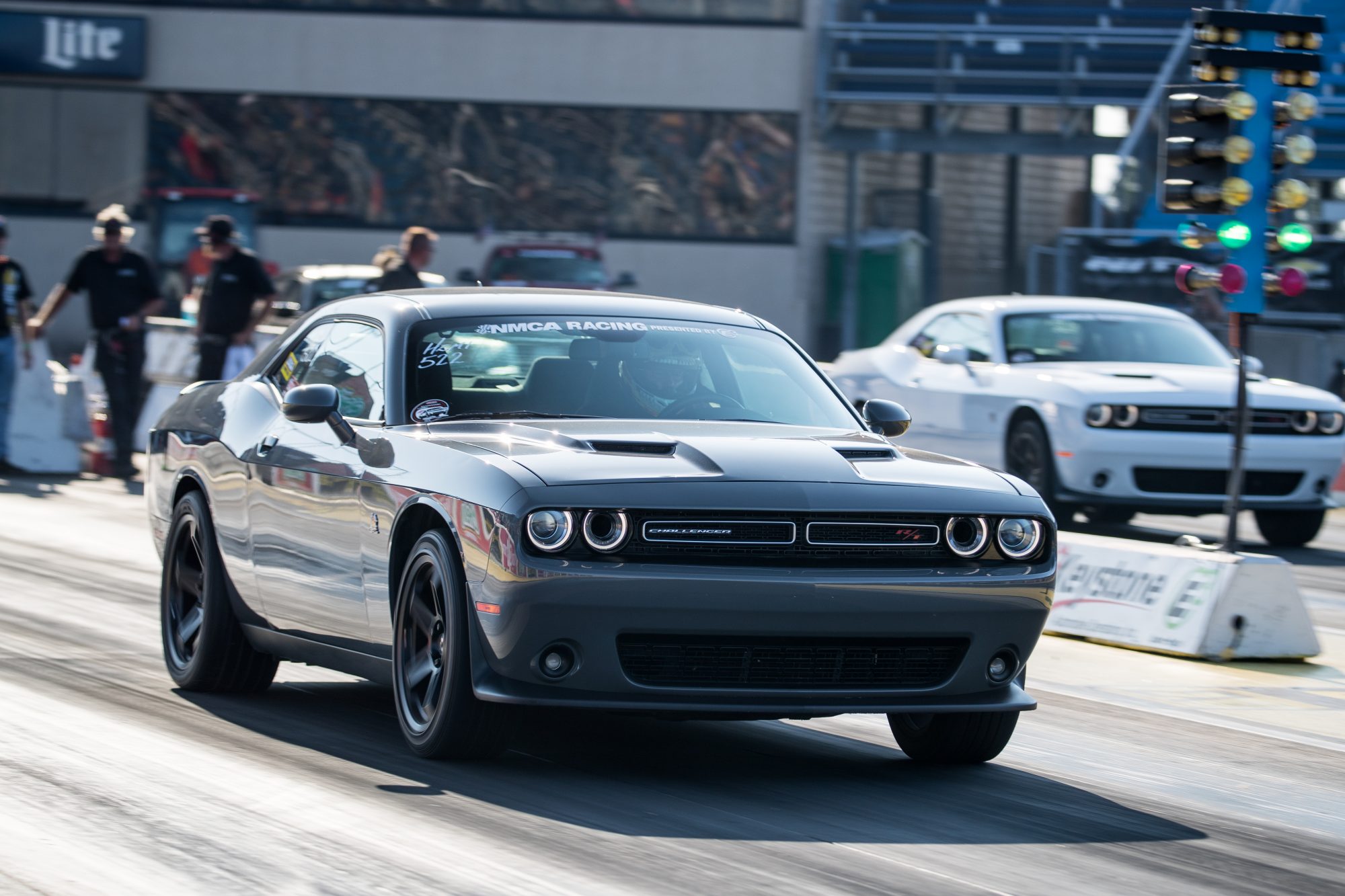 two dodge vehicles staging to drag race 