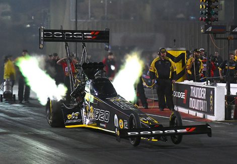 leah pritchett's top fuel dragster coming off the starting line