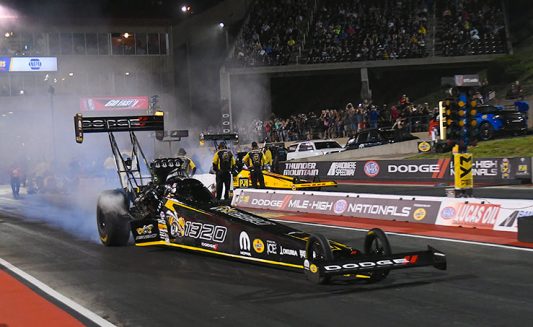 leah pritchett's top fuel dragster at the starting line