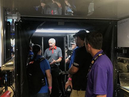 students getting a tour of a trailer