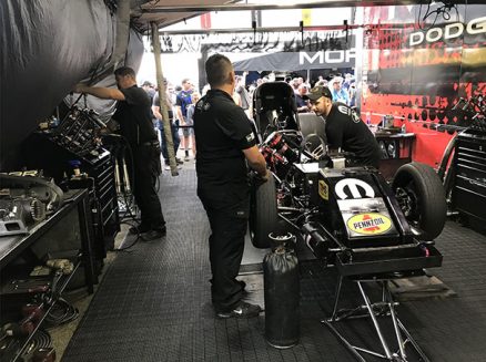 crew team working on matt hagan's funny car