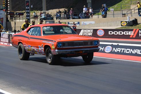 vehicle on the starting line of a drag strip