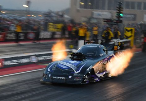 funny car racing down the drag strip