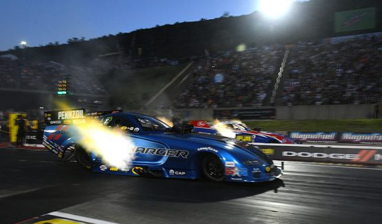 funny car racing down the drag strip