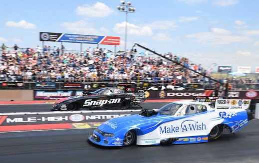 funny cars on the starting line