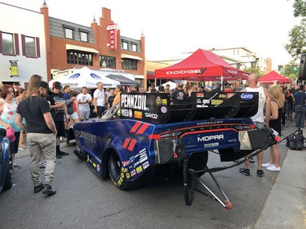 crowd looking at matt hagan's 2020 dodge charger srt hellcat widebody funny car