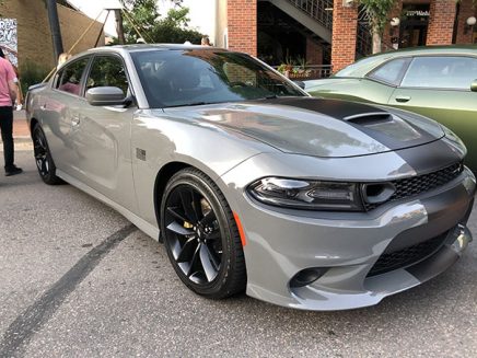 silver vehicle with a thick black stripe on the hood