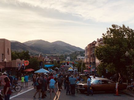 street filled with people at sunset