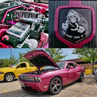 a pink a red vehicle and its engine