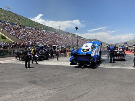 funny car being prepped for race