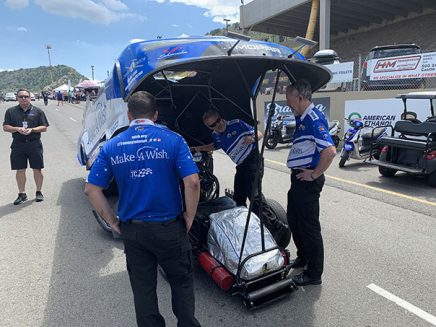 funny car being prepped for race