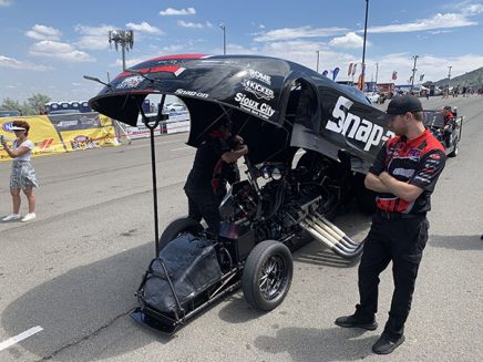 funny car being prepped for race